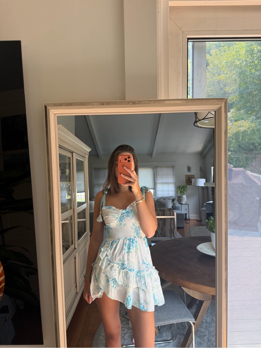 Sleeveless White Mini Dress with Light Blue Floral Print